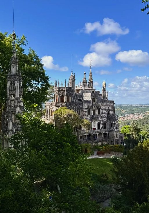 Pena Palace on its ridge above the wooded Serra de Sintra