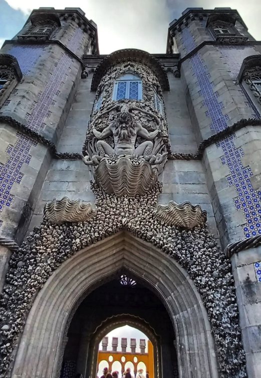The ochre and vermilion facades of Pena Palace in Sintra
